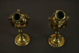 A pair of early 20th century ship nautical gimbal brass candle stick holders with wall mounts. H.