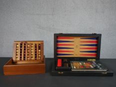 A vintage K&C Ltd, London Backgammon set along with a Captains Mistress game. H.6 W.43 D.25cm