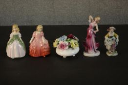 Four hand painted ceramic figures and a flower basket, three by Royal Doulton. Maker's marks to