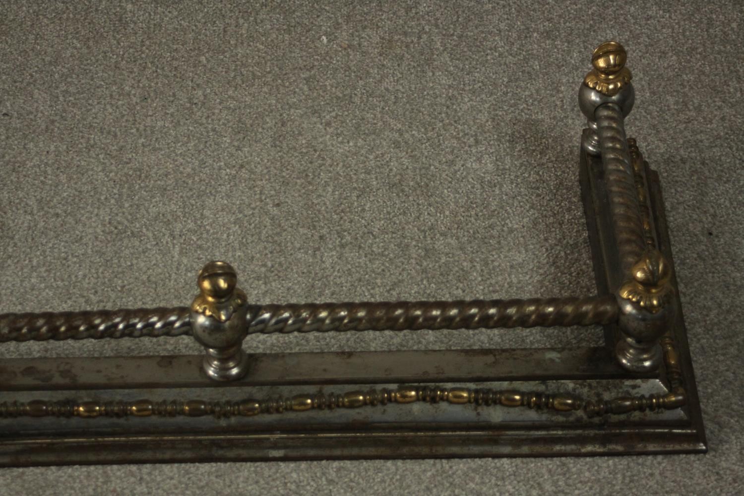 A 19th century steel and brass fender, with rope twist rail. L.170 D.40cm. - Image 4 of 9