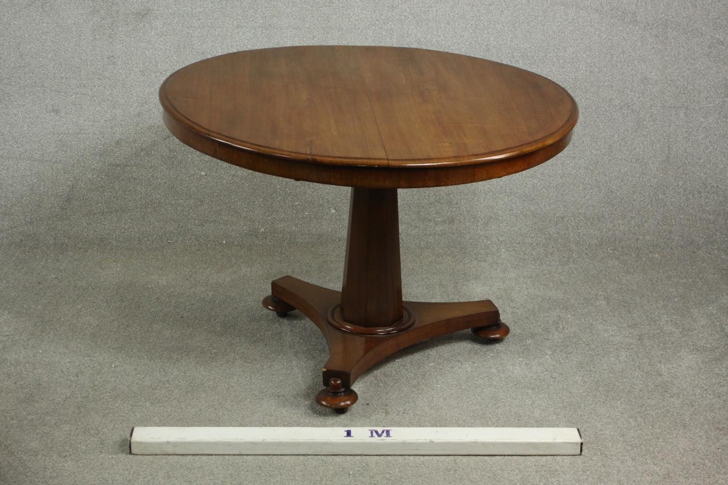 A mid 19th century walnut tilt top table, the circular top with a moulded edge, on a chamfered - Image 2 of 8