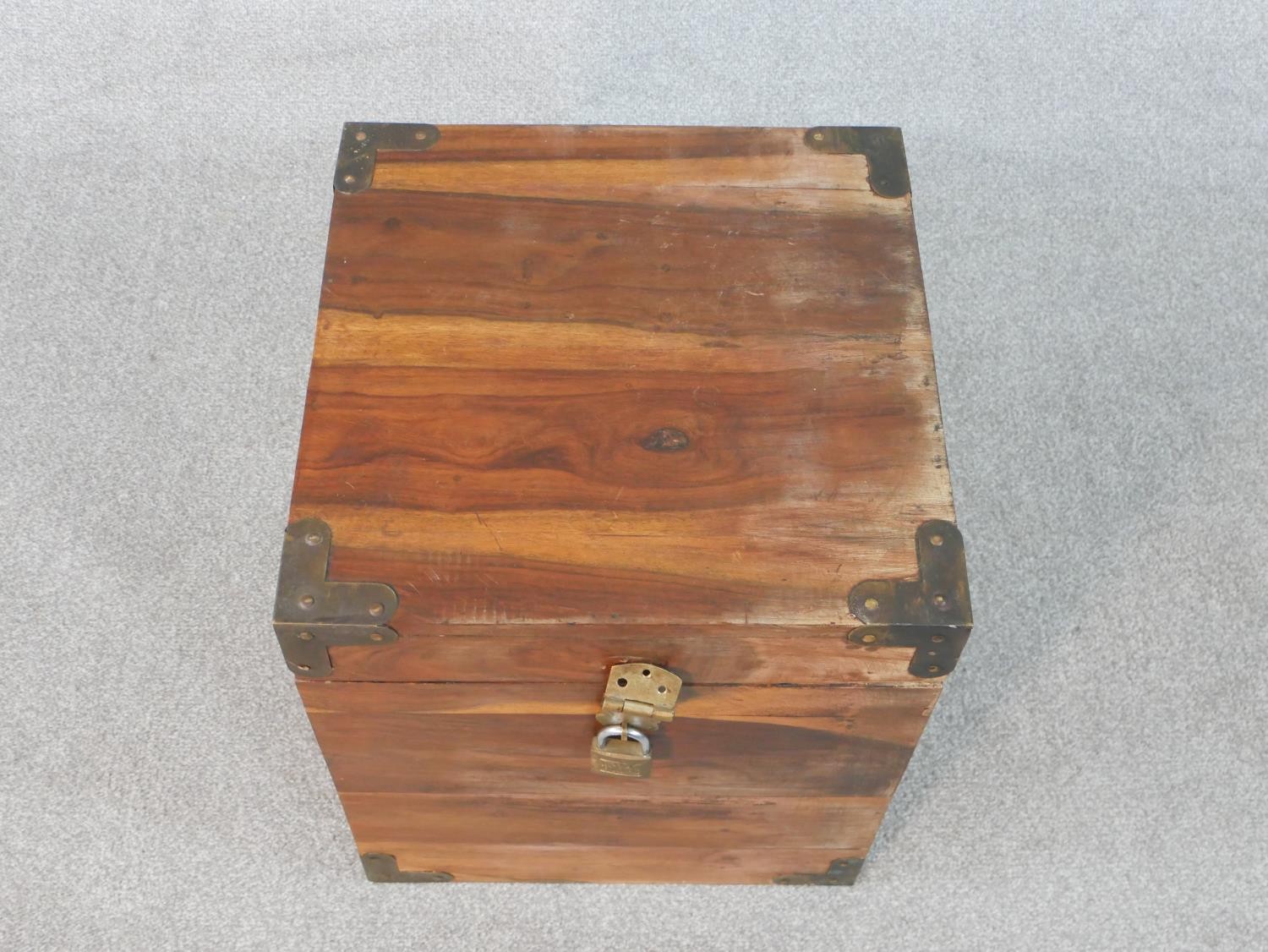 An Indian hardwood cube chest with brass detailing to the corners and padlock. H.46 W.40 D.40cm - Image 2 of 7