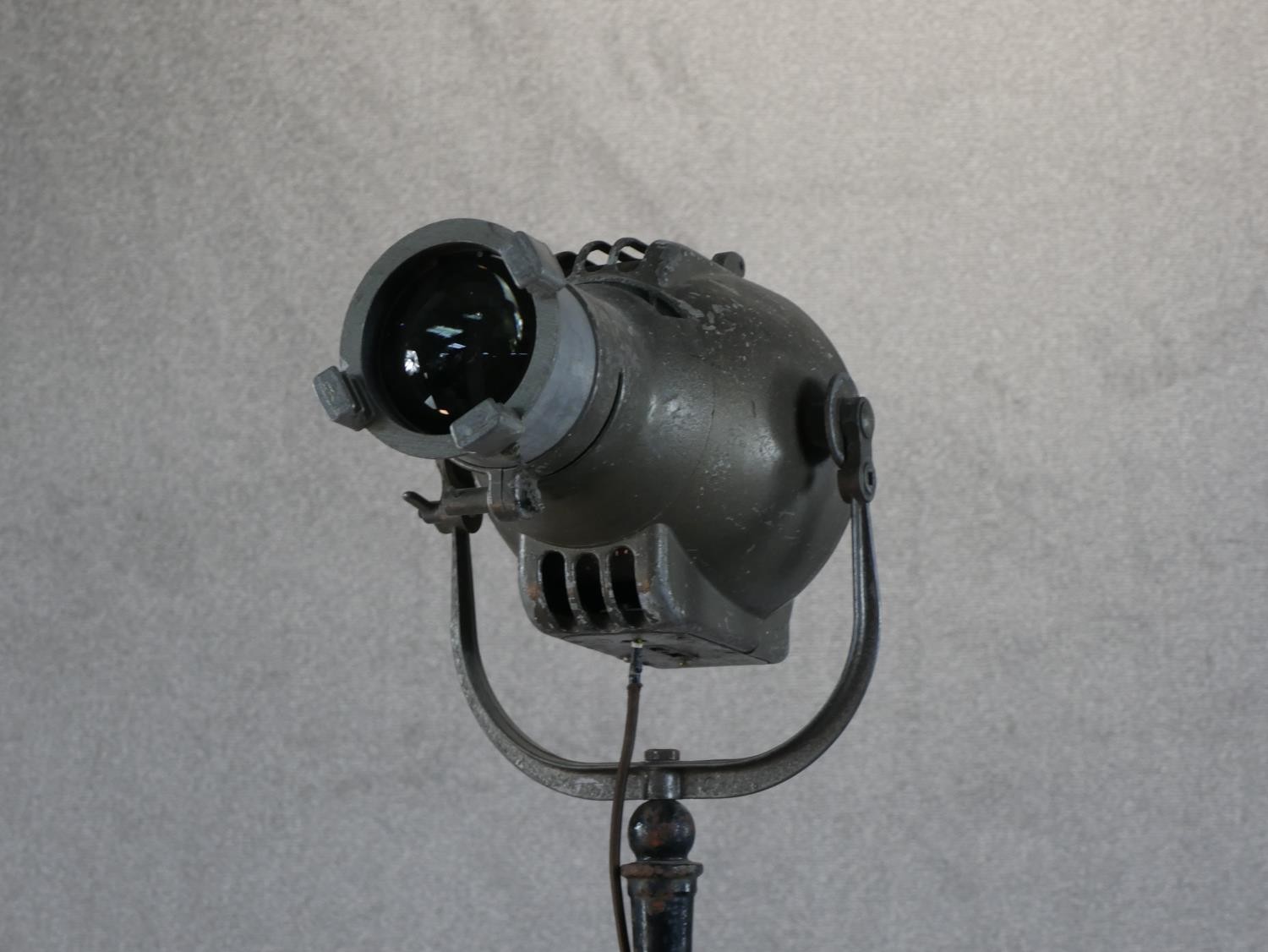 A Strand Electric theatre spotlight, on a cast iron stand. H.190 W.41 D.41cm - Image 4 of 6