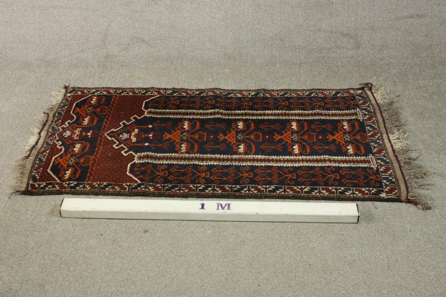 A hand made black ground Belouch rug. L.140 W.75cm. - Image 2 of 3