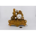 A 19th century French gilt ormolu mantle clock of a Classical figure, young boy with a sheep,