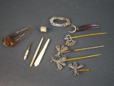 A collection of Victorian hair ornaments and sewing items, including three 19thC cut steel hair pins