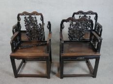 A set of four late Qing dynasty Chinese hardwood throne chairs, possibly hingmu or huanghuali, the