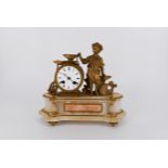 A 19th century gilt ormolu and white marble mantle clock with white enamel dial and black Roman