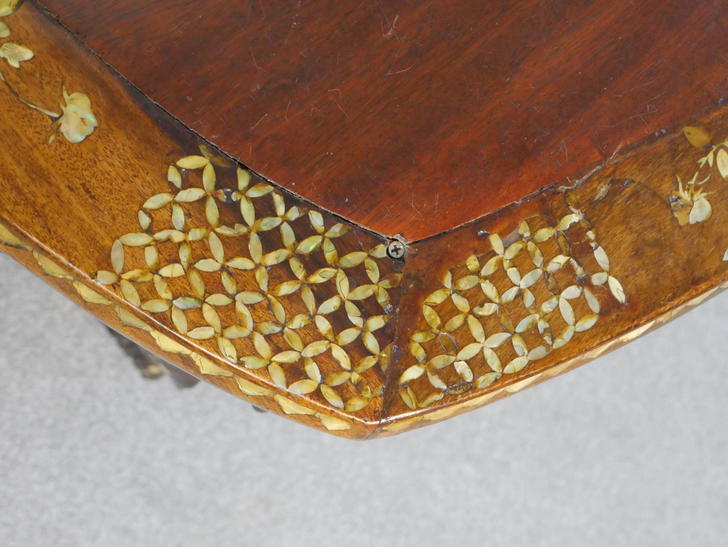 An early 20th century Chinese hardwood table with carved figural legs, all over inlaid with a mother - Image 4 of 8