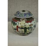 A large early 20th century Chinese hand painted ceramic urn with lid. The urn decorated with a