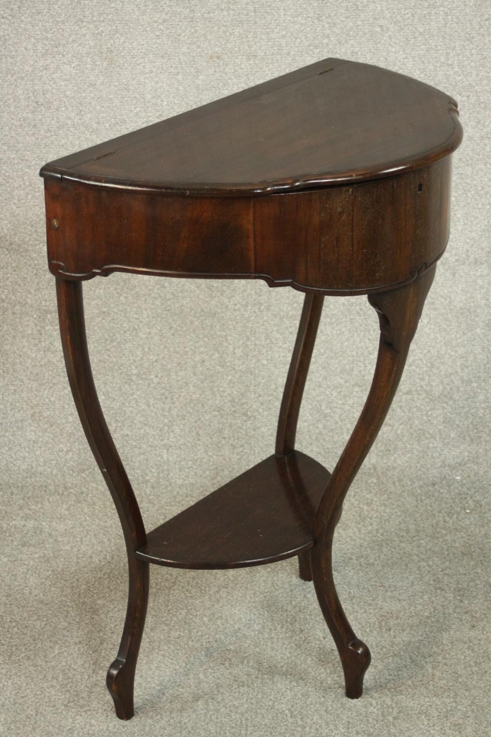 An early 20th century mahogany demi lune side table, with a foldover top opening to reveal a - Image 4 of 7