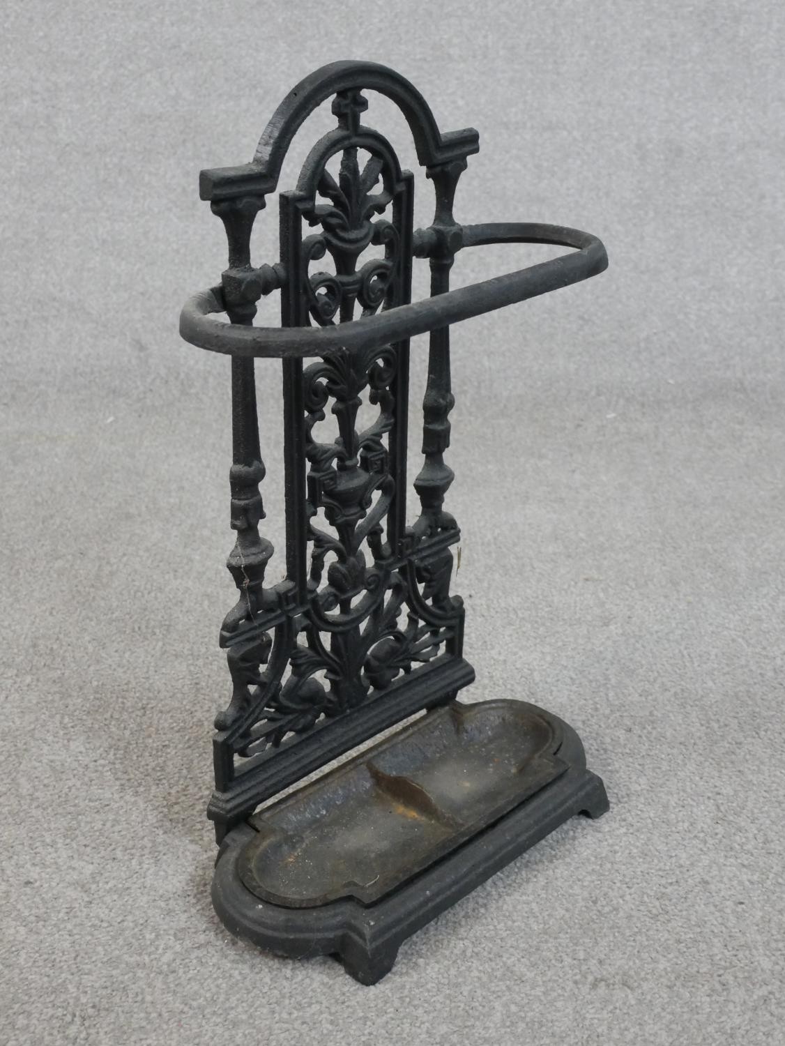 A 19th century black painted cast iron umbrella stand, with a removable drip tray. H.53 W.33 D.15cm - Image 5 of 5