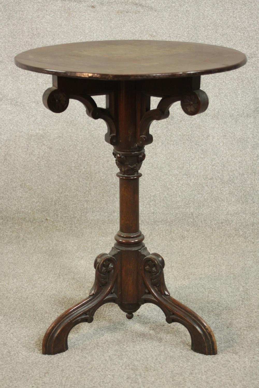 A Victorian ecclesiastical mahogany occasional table, with a circular top supported by carved - Image 5 of 6