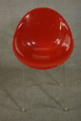 Philippe Starck for Kartell, a Mr Impossible Chair, red polycarbonate.