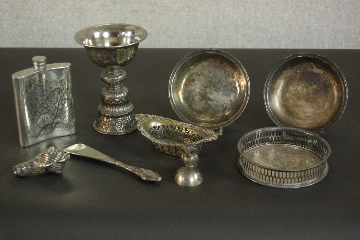 A collection of silver and silver plate items, including a novelty silver owl menu holder, a