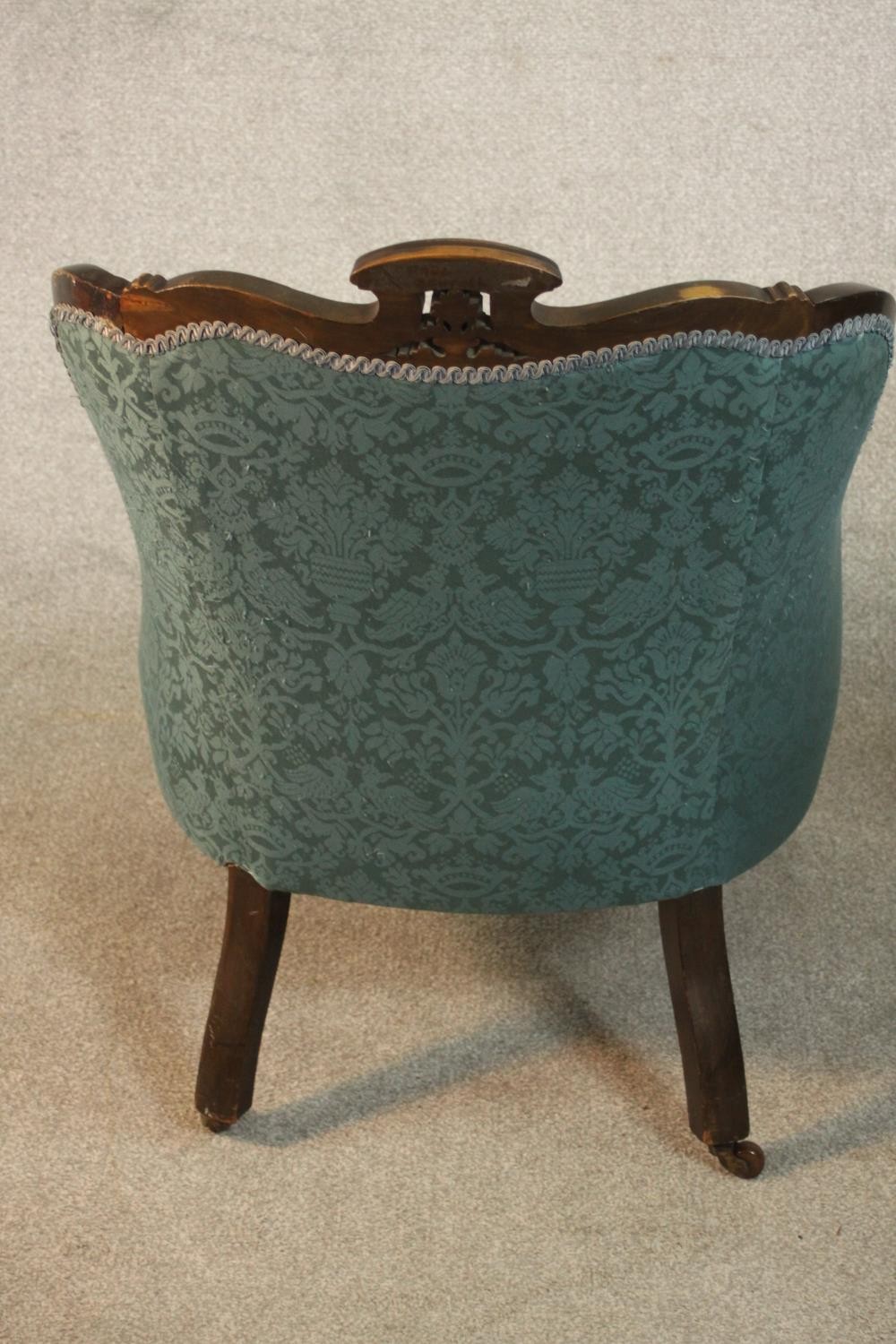 A pair of Edwardian walnut tub armchairs, upholstered in buttoned blue damask, with scrolling arms - Image 8 of 10