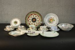 A collection of tea cups and pieces of porcelain and ceramics, including a Royal Doulton Glamis