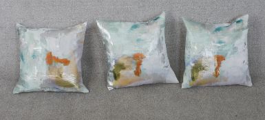 Three contemporary silk/cotton mix abstract colourful design cushions. H.50 W.50cm