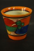 A 1930s Clarice Cliff Fantastique Melon pattern beaker, maker's marks to the base. H.7.5 Dia.7.5cm.