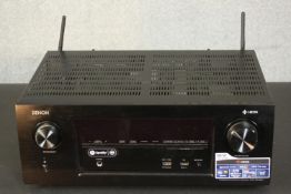 A Denon integrated AV network receiver, HE0S amplifier, model AVR-X2400H. H.24 W.43 D.33cm.