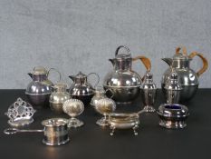 A collection of silver plated items, including two shell menu holders, salts and four Jersey cream