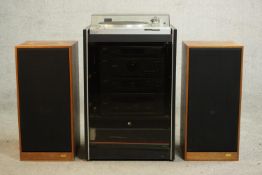A Phillips stack HI system with turntable and a pair of Spendor speakers. H.82 W.49 D.42cm.