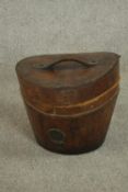 A Victorian brown leather hat box. H.33 W.35 D.34cm.