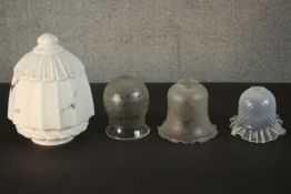 Four vintage glass lamp shades, including an opalescent blown glass ripple edge shade, a marble