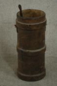 A late 19th/ early 20th century artillery shell carrier, together with walking stick. H.63 Dia.25cm