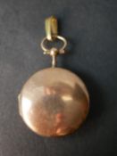 An antique yellow metal (tests as 14 carat) spherical locket/pomander. One side opens to reveal a