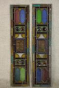 A pair of Victorian stained glass front door panels, with polychrome design, each with a central