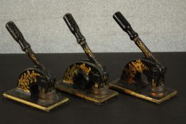 Three Victorian T. H. Marriot gilded iron paper presses, each decorated with a floral and foliate