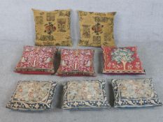 Eight Aubusson style tapestry cushions, three with fruit and flower design, a pair with bird and