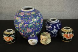 A collection of Chinese ginger jars and a Japanese hand painted crackle glaze flora design pot