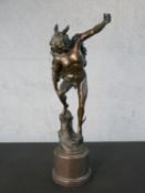 After Giambologna, a large patinated bronze figure of Mercury, on a circular marble base, signed and