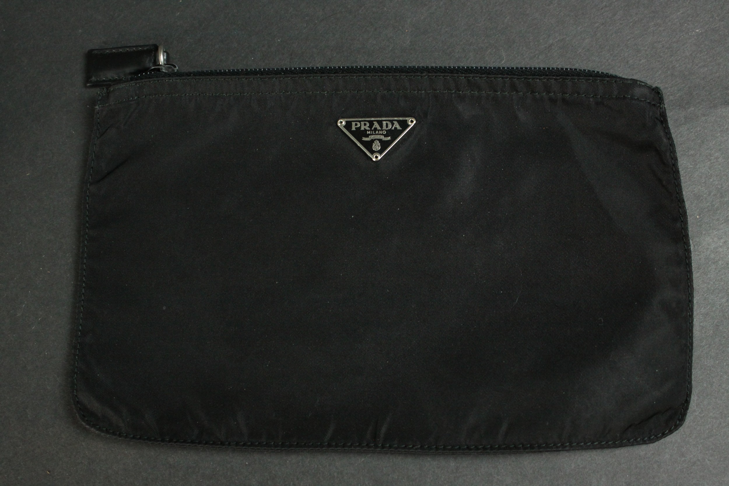 A vintage black silk Prada zip purse along with a Philip Lim metallic blue leather clutch bag. H. - Image 6 of 6