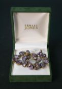 A Edwardian gilt chain link amethyst bracelet and lavaliere style amethyst and seed pearl