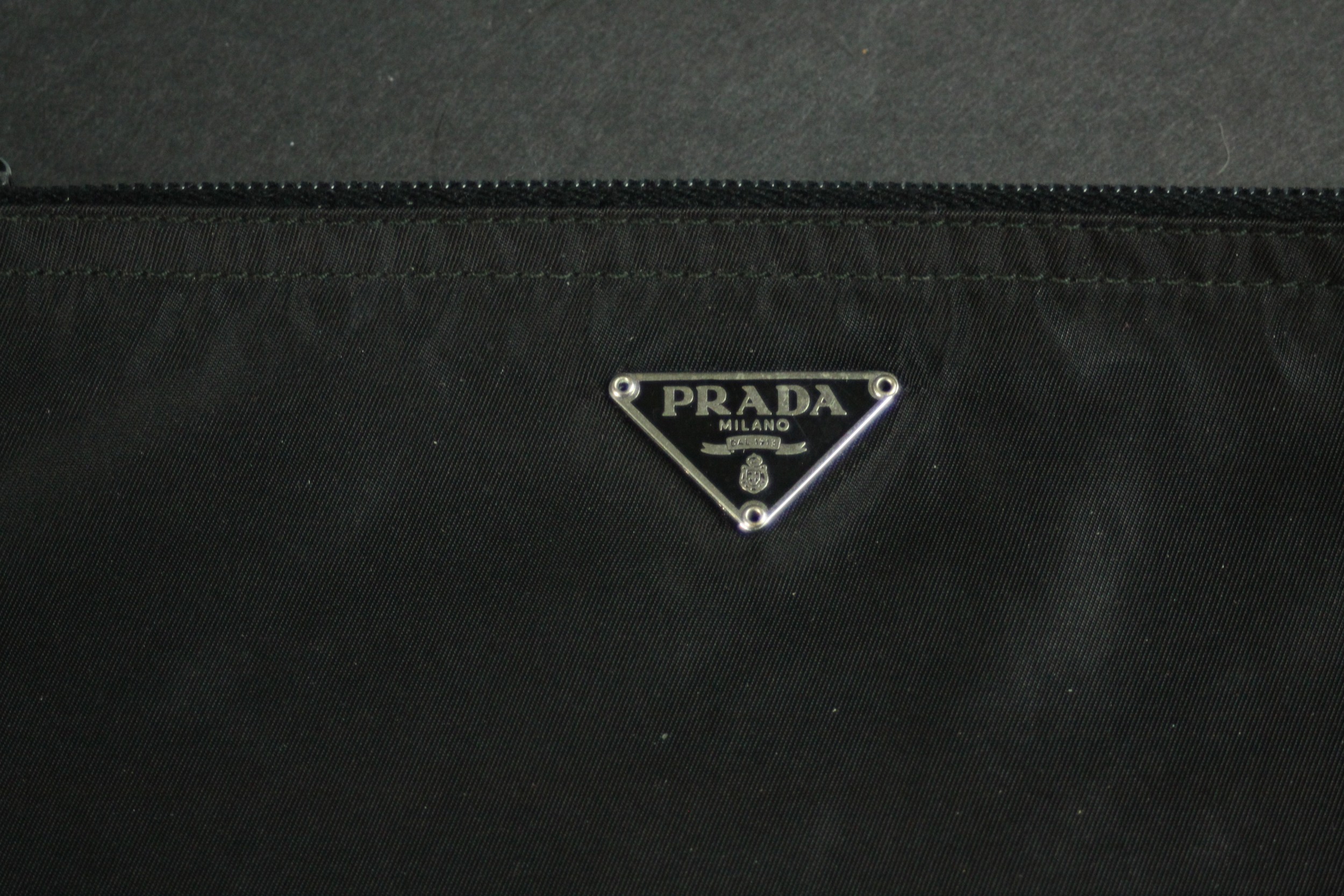 A vintage black silk Prada zip purse along with a Philip Lim metallic blue leather clutch bag. H. - Image 3 of 6