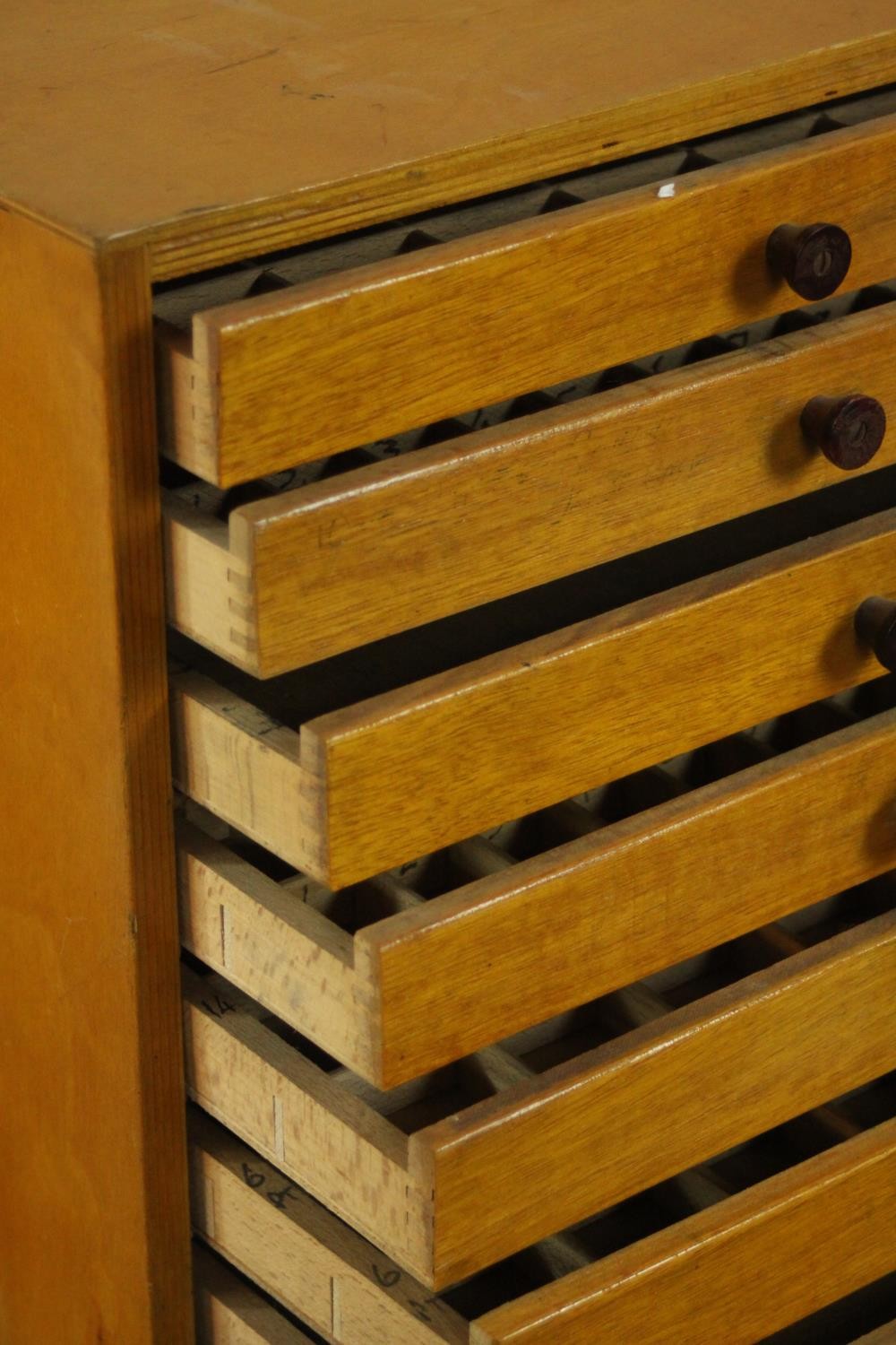 A mid 20th century birch plywood tabletop collector's cabinet of eight drawers. H.32 W.31 D.20cm. - Image 4 of 6