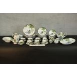 An eight person part Japanese Kutani China eggshell porcelain dinner and tea service, painted with