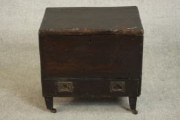 An early 19th century campaign mule chest, with a rising lid over a long drawer with recessed