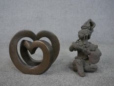 An Oriental seated clay figure along with a Frith Enduring Love bronze resin sculpture by Adrian