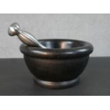 A John Julian design black marble and brushed chrome pestle and mortar. Diam.20cm