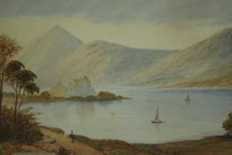 A framed and glazed 19th century watercolour of a lake scene with mountains in the distance,