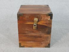 An Indian hardwood cube chest with brass detailing to the corners and padlock. H.46 W.40 D.40cm