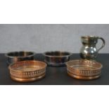 Two pairs of silver plate and oak wine bottle coasters, one with pierced design and a pint measure