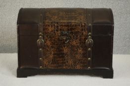 A faux leather and faux alligator skin chest with brass hardware. H.34 W.48 D.29.5cm.