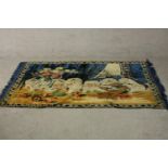 A machine made tapestry wall hanging depicting a group of curious cats and kittens. L.186 W.