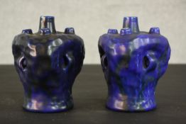 A pair of Bretby art pottery asymmetrical vases with blue glazes, model number 1680, stamped marks