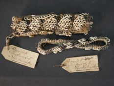 Two 19th-early 20th century armlets from the New Hebrides, made of small discs of white shell sewn